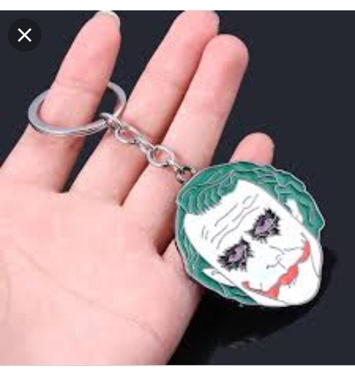 Green joker face  rotating key chain