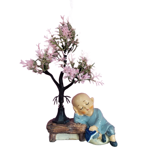 Monks relaxing under tree showpeice