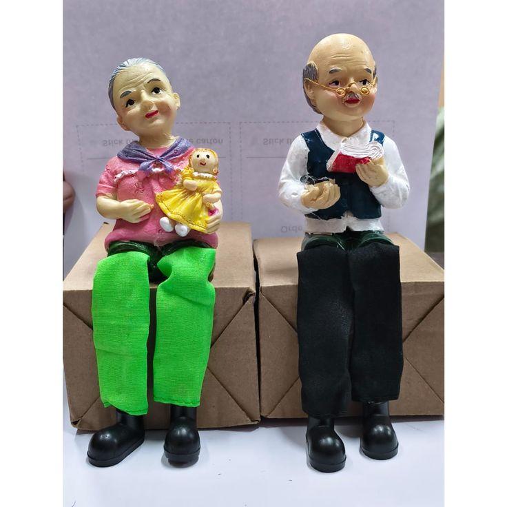 2 Pairs - Dada Book , dadi with potti approx 15cm . Net pair cost 130