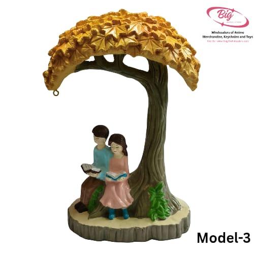 Couple sitting under the tree colourful  lamp