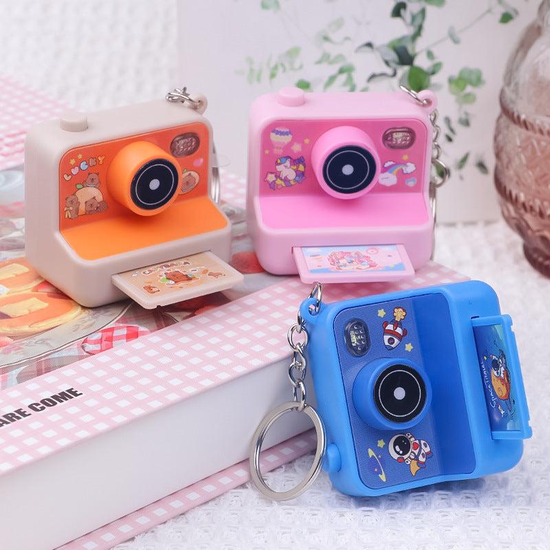 12pc- Camera with sound & Light  keychain net price 75