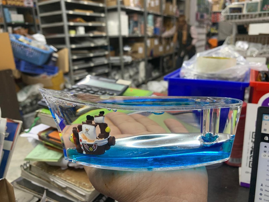 Ship Shaped showpeice inside is luffy boat with pen stand